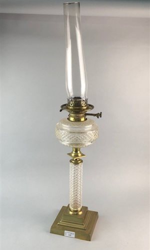 Lot 145 - A BRASS AND CUT GLASS OIL LAMP
