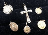 Lot 149 - AN EIGHTEEN CARAT GOLD CRUCIFIX AND OTHER GOLD RELIGIOUS SUBJECT MEDALLIONS