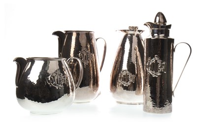 Lot 1825 - A LOT OF TWO SILVER PLATED WATER JUGS AND TWO INSULATED JUGS BY CHRISTIAN DIOR