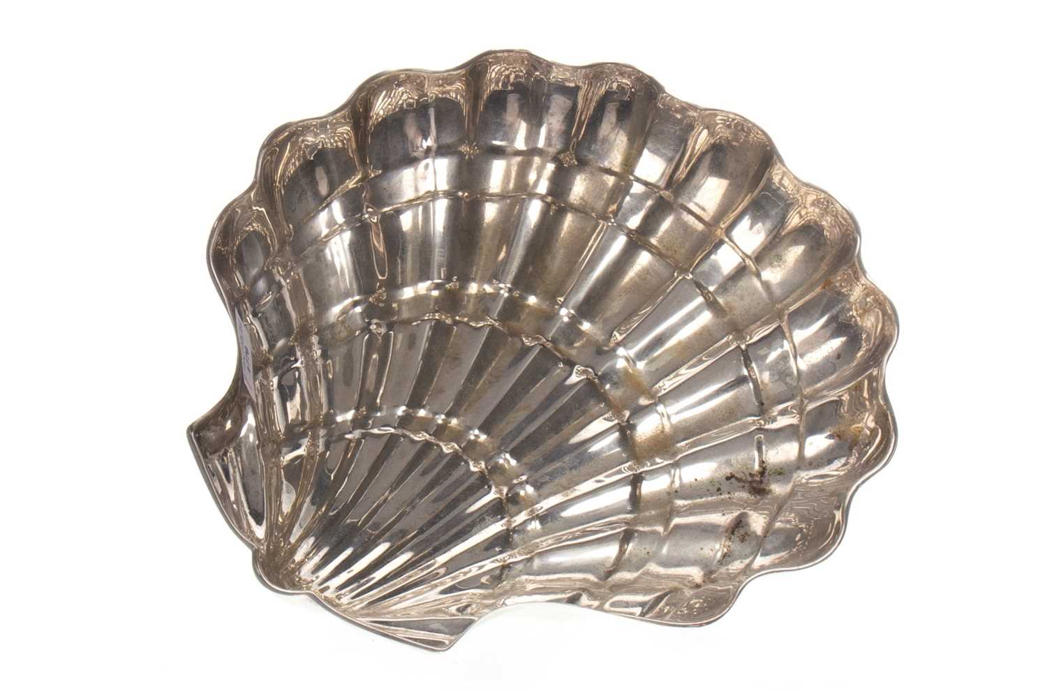 Lot 1770 - A SILVER PLATED OYSTER DISH IN THE FORM OF A SHELL