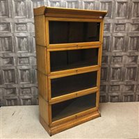 Lot 1804 - AN EDWARDIAN OAK FOUR SECTION STACKING BOOKCASE