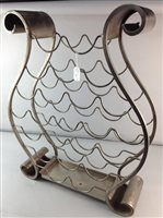 Lot 306 - A STAINLESS STEEL WINE RACK