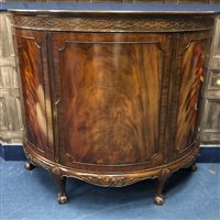 Lot 365 - A MAHOGANY DEMI LUNE LOUNGE COMMODE CABINET