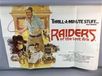 Lot 389 - A RAIDER'S OF THE LOST ARK POSTER WITH A HELMET AND STAR WARS MAGAZINE