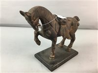 Lot 314 - A CAST METAL SCULPTURE OF A CHINESE STYLE HORSE