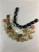 Lot 323 - A COLLECTION OF HARDSTONE BEADS