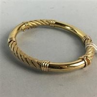 Lot 423 - A NINE CARAT GOLD BANGLE