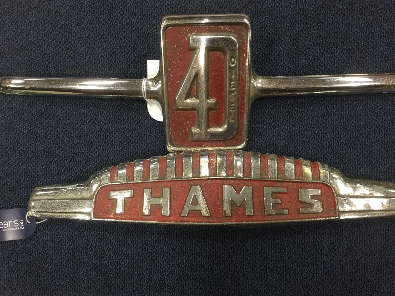 Lot 81 - TWO FORD THAMES RADIATOR BADGES,upper badge and central badge (2)