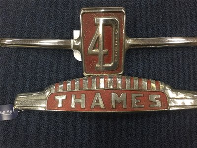 Lot 81 - TWO FORD THAMES RADIATOR BADGES,upper badge and central badge (2)