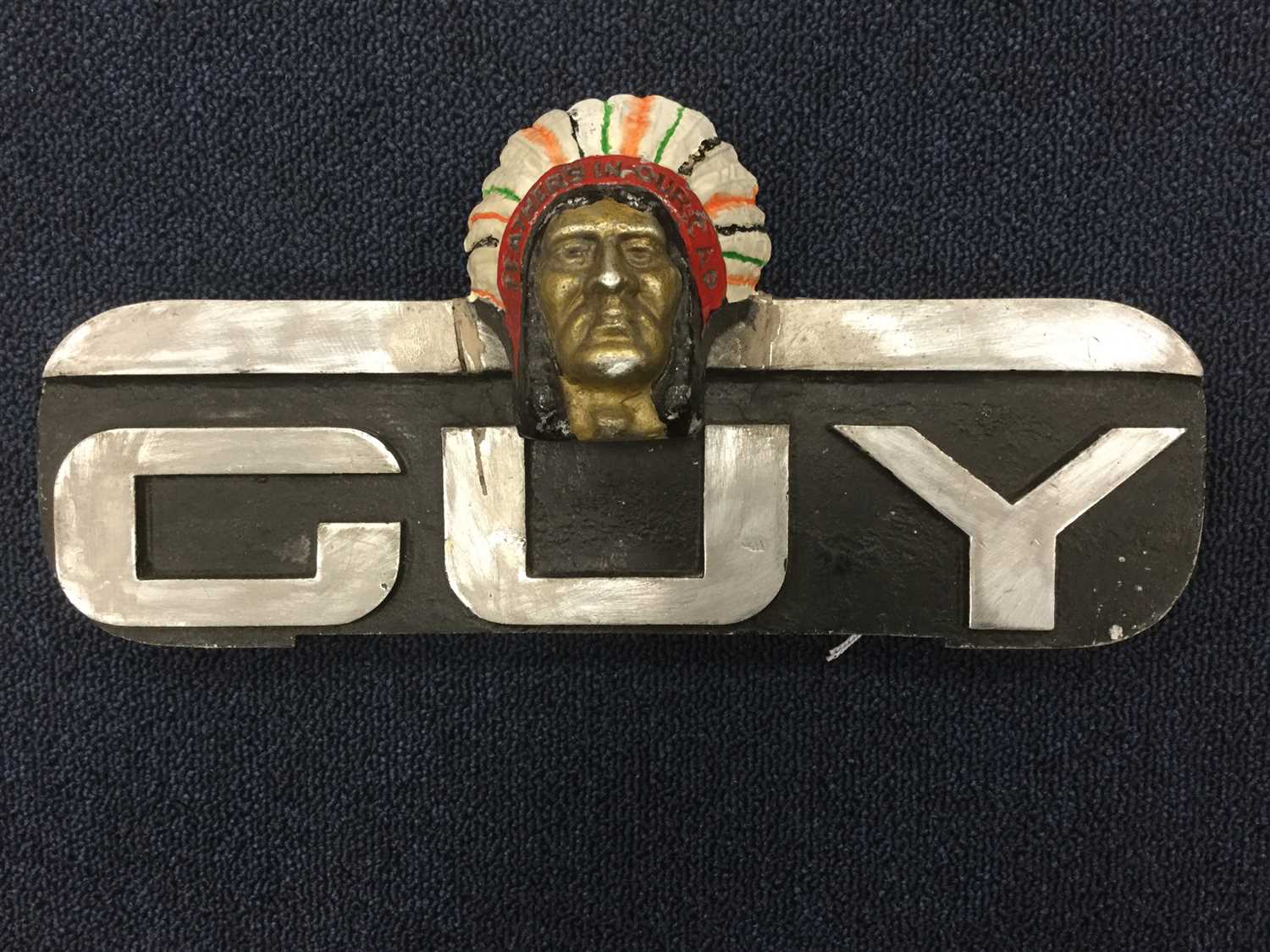 Lot 82 - GUY 'BIG J' FEATHERS IN OUR CAP RADIATOR BADGE