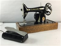 Lot 494 - A CASED SINGER SEWING MACHINE