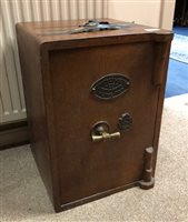 Lot 489 - A CAST IRON FLOOR STANDING SAFE