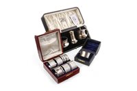 Lot 893 - A GEORGE V SILVER CRUET SET AND EIGHT SILVER NAPKIN RINGS