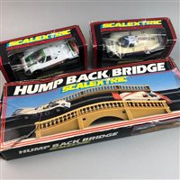 Lot 64 - A SCALEXRTIC ALPINE RALLYE BOXED GAME, TWO MODEL VEHICLES AND A BRIDGE SET