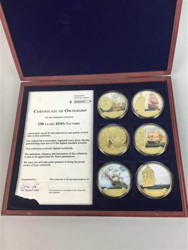 Lot 52 - AN HMS VICTORY 250 YEARS PRESENTATION COIN SET, AMBER NECKLACE AND DIE-CAST VEHICLES