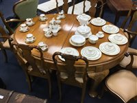 Lot 143 - A WALNUT DINING ROOM SUITE