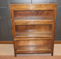 Lot 1009 - OAK THREE SECTION STACKING BOOKCASE the top...