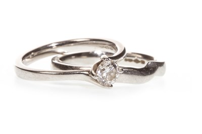 Lot 107 - A DIAMOND SOLITAIRE RING AND A SHAPED BAND
