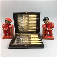 Lot 110 - A MODEL RACING CAR, BOOKENDS, FISH KNIVES AND FORKS