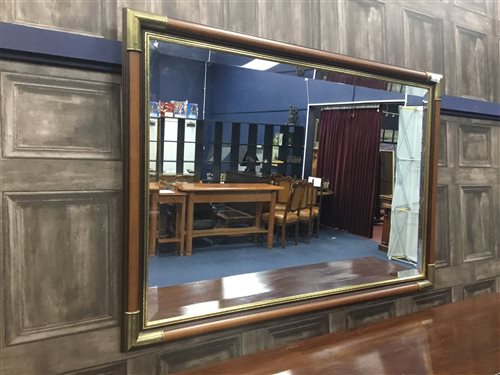Lot 44 - A WALL MIRROR IN A STAINED WOOD FRAME