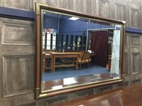 Lot 44 - A WALL MIRROR IN A STAINED WOOD FRAME