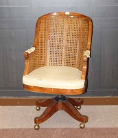 Lot 1029 - CAPTAINS' STYLE OAK SWIVEL ELBOW CHAIR with...