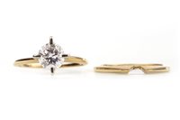 Lot 136 - DIAMOND SOLITAIRE RING AND SHAPED WEDDING BAND