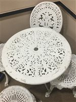 Lot 261 - A CAST IRON GARDEN TABLE AND FOUR CHAIRS
