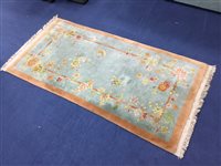 Lot 160 - A CHINESE WOOL BORDERED CARPET