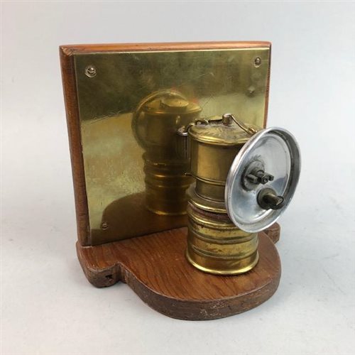 Lot 291 - A MINERS LAMP