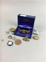 Lot 255 - A LADY'S TISSOT WRIST WATCH, MILITARY BADGES AND A FOB WATCH