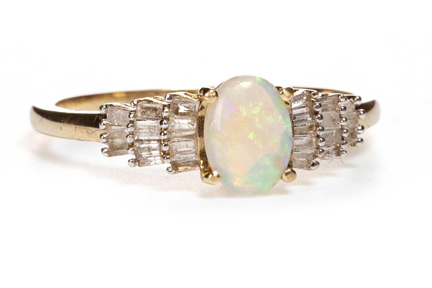 Lot 34 - AN OPAL AND DIAMOND RING