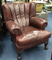 Lot 328 - A BROWN LEATHER ARM CHAIR