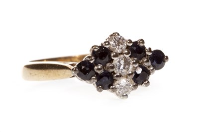 Lot 42 - A BLUE GEM AND DIAMOND CLUSTER RING