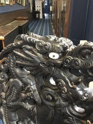 Lot 1027 - A CARVED WOOD ARMCHAIR