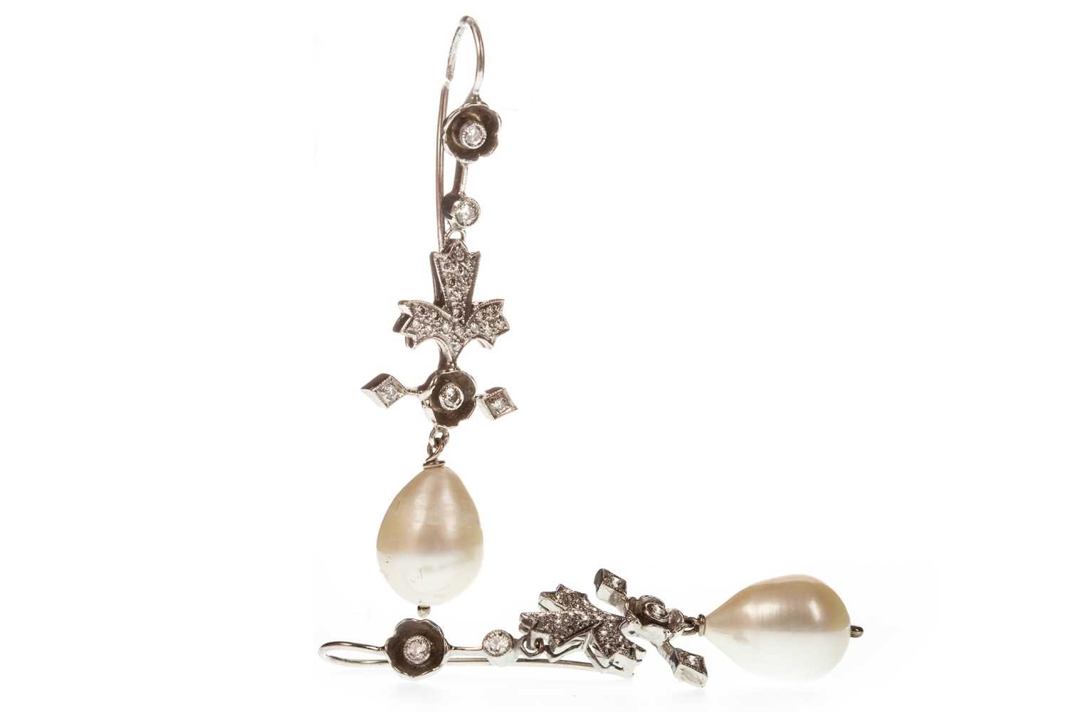 Lot 77 - A PAIR OF LATE PEARL AND DIAMOND DROP EARRINGS