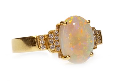 Lot 176 - AN OPAL AND DIAMOND RING
