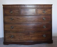 Lot 1101 - REGENCY MAHOGANY BOW-FRONT CHEST of three...