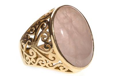 Lot 224 - A PINK HARDSTONE RING