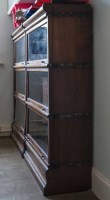 Lot 1104 - PAIR OF WALNUT SECTIONAL BOOKCASES BY GLOBE...