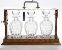 Lot 1118 - 20TH CENTURY OAK FRAMED THREE DECANTER...