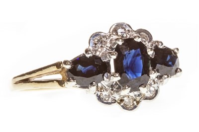 Lot 59 - A BLUE GEM AND DIAMOND CLUSTER RING