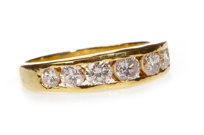 Lot 60 - A DIAMOND SEVEN STONE RING