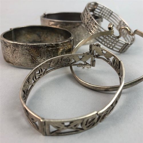 Lot 4 - A LOT OF FOUR SILVER BANGLES AND ONE OTHER