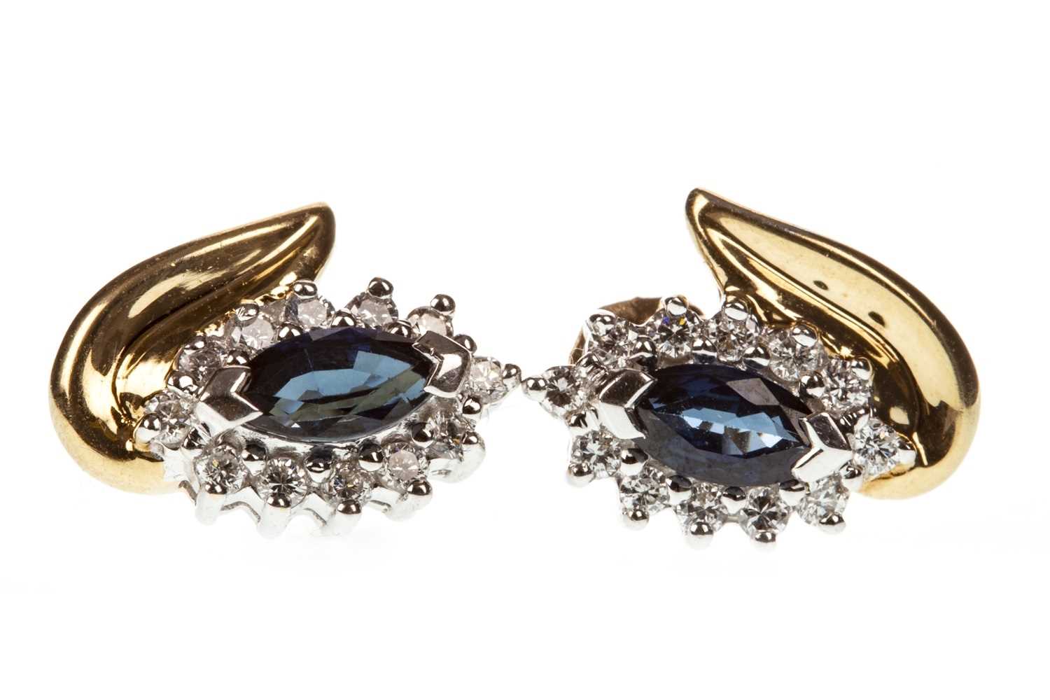 Lot 171 - A PAIR OF BLUE GEM  AND DIAMOND CLUSTER EARRINGS