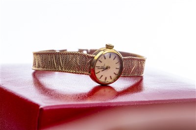 Lot 833 - A LADY'S OMEGA GOLD COCKTAIL WATCH