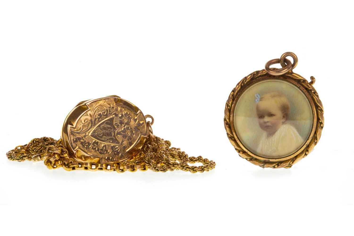 Lot 153 - TWO EARLY 20TH CENTURY LOCKETS ON CHAINS