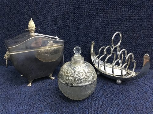 Lot 73 - A VICTORIAN SILVER PLATED TEA CADDY, SILVER MOUNTED PERFUME BOTTLE AND A TOAST RACK