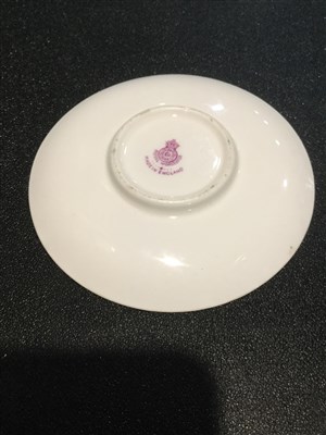 Lot 1066 - A ROYAL WORCESTER CUP AND SAUCER BY HARRY STINTON