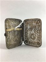 Lot 80 - A SILVER FILIGREE CIGARETTE CASE WITH TWO MODELS OF DOGS